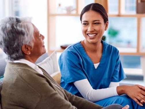 healthcare-happy-nurse-talking-old-woman-nursing-home-during-visit-checkup-medical-smile-female-medicine-professional-having-conversation-with-senior-resident_590464-191695